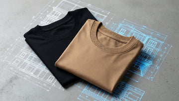 ditorial lookbook banner showcasing premium minimalist heavyweight streetwear uniforms outside a modern corporate tech office building.