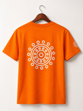 
Back view of an oversized orange cotton T-shirt featuring a large white mandala graphic print centered on the back and a matching sleeve print.