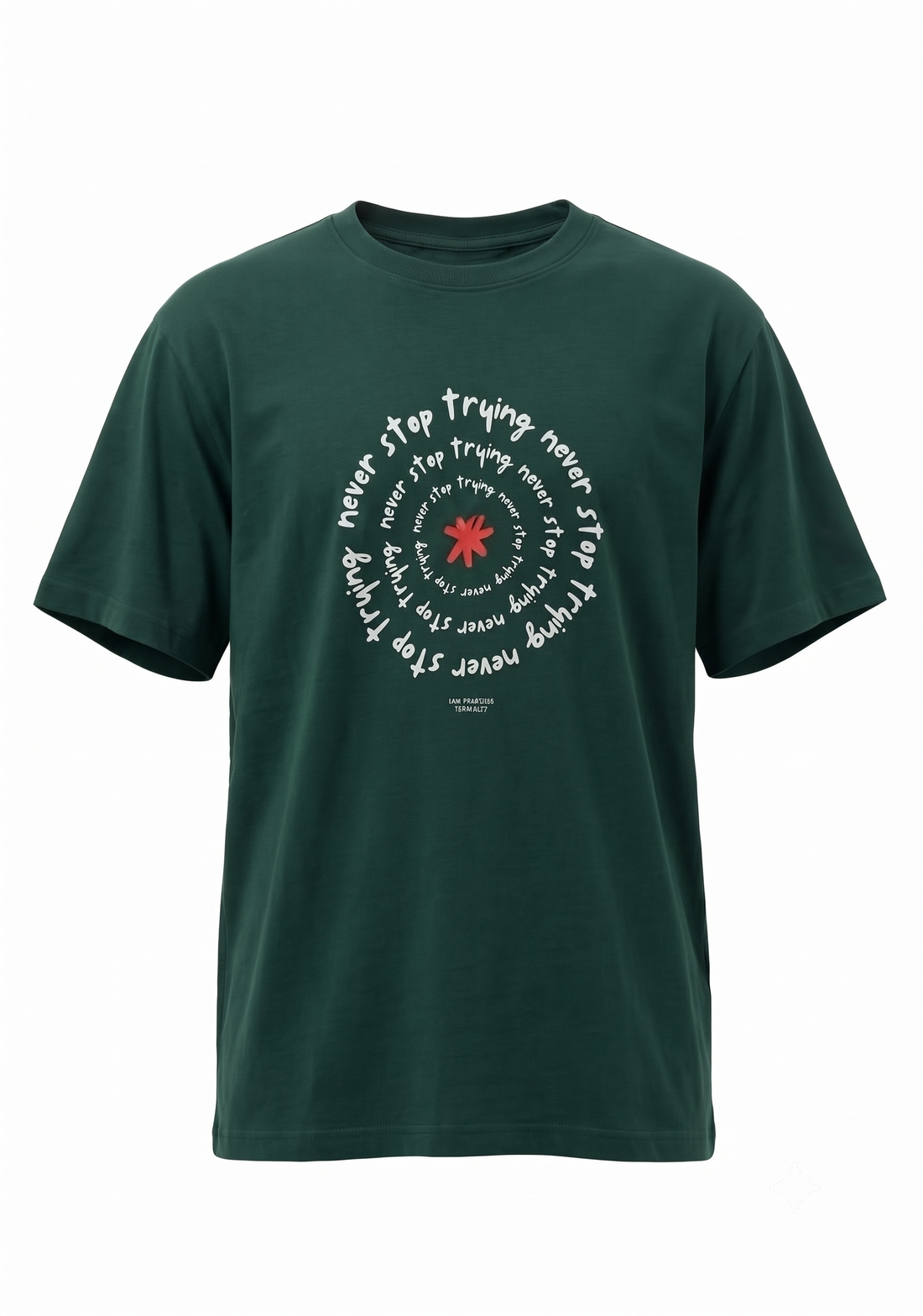A flat-lay or hanger view of the dark green cotton t-shirt. The chest features a large, central circular graphic with white text repeating "never stop trying" around a red asterisk. A brand label is visible at the neck.