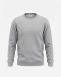 Front view of male model wearing The Sabio oversized heather grey fleece sweatshirt paired with light wash denim.