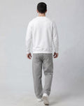 Full length back profile of male model wearing The Sabio structured white pullover sweatshirt.