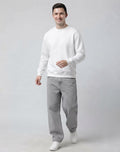 Back view and neck collar detailing of The Sabio white cotton fleece sweatshirt on male model.